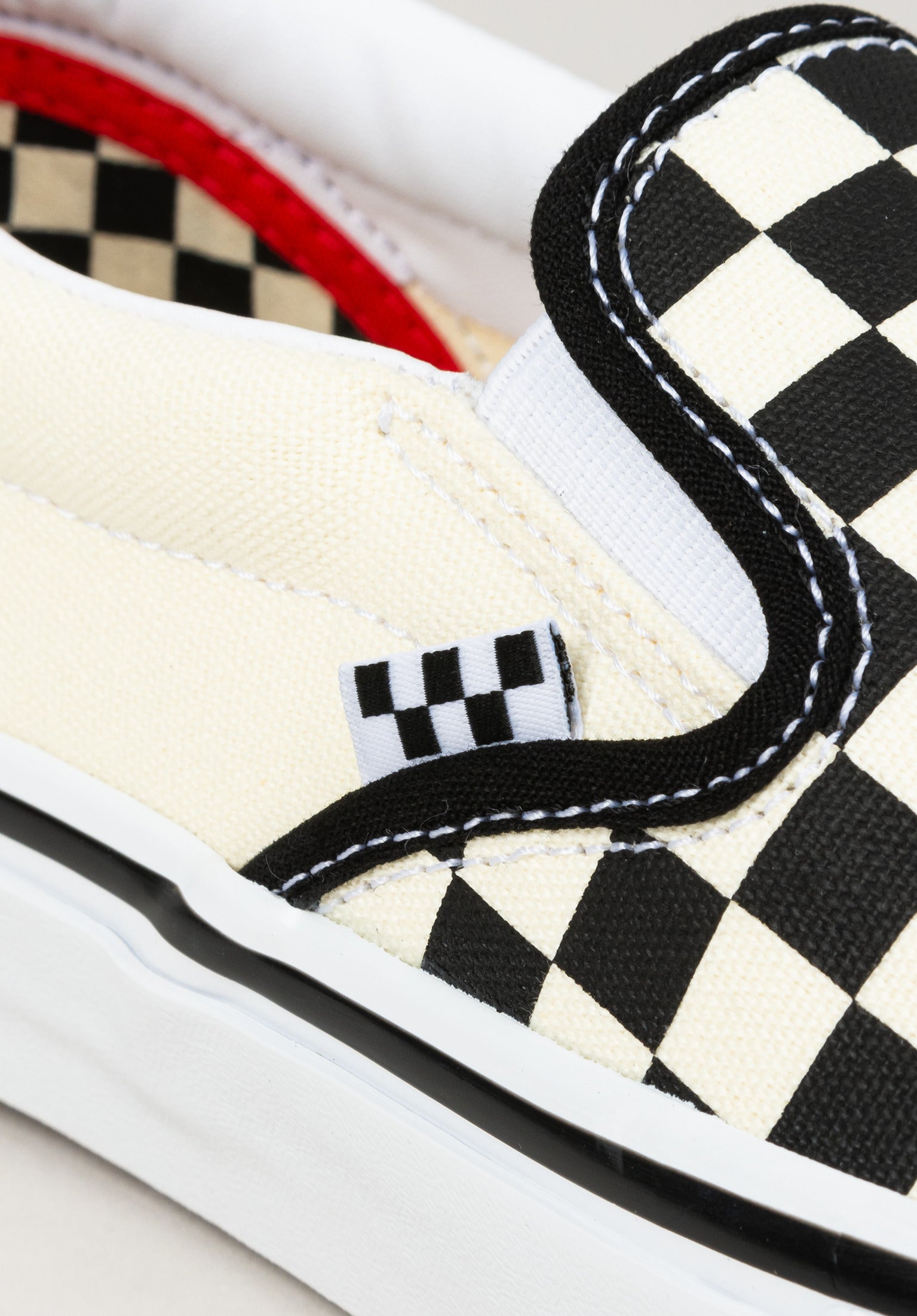 Black and white checkered van slip ons best sale