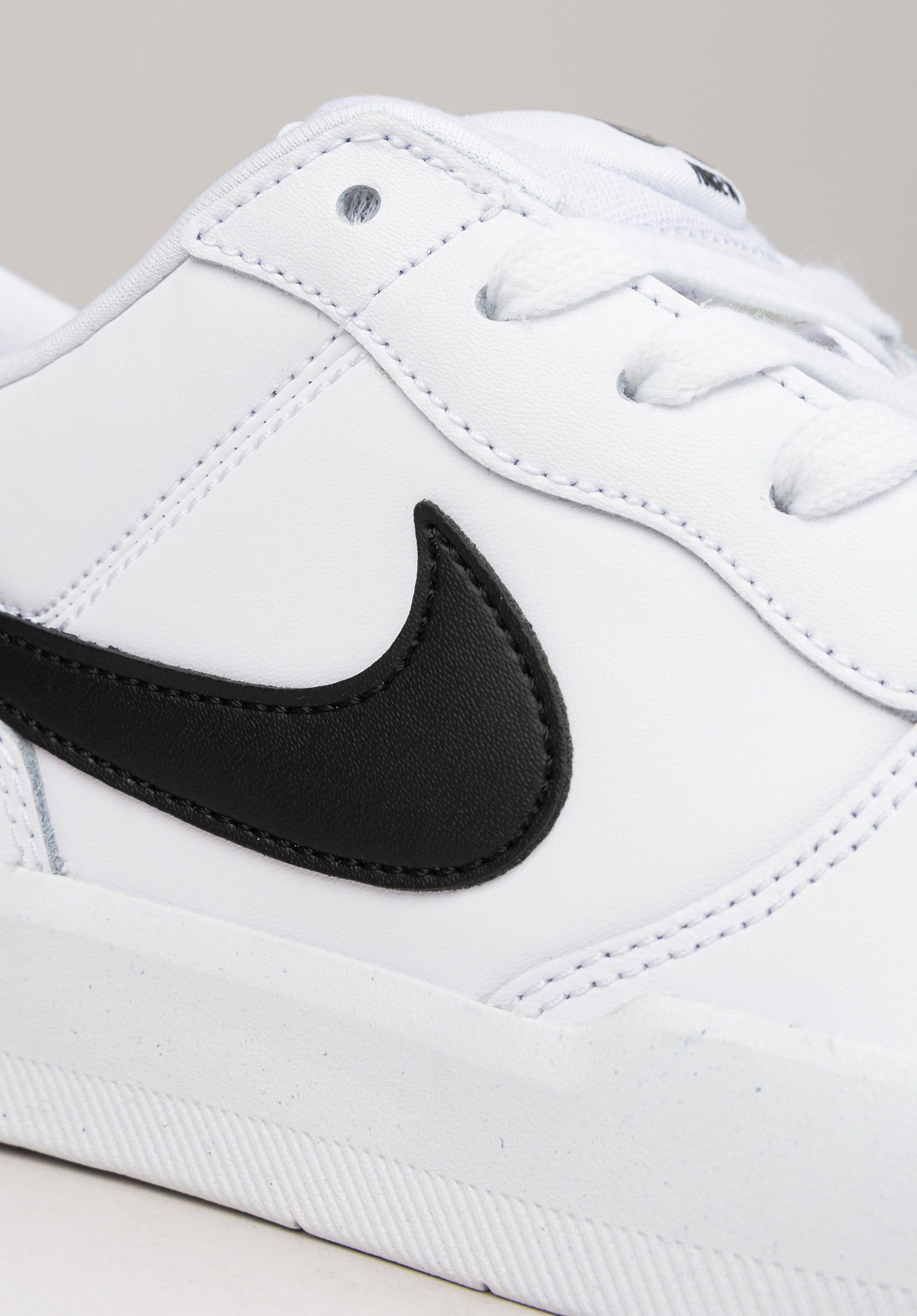 Nike black and white leather shoes online