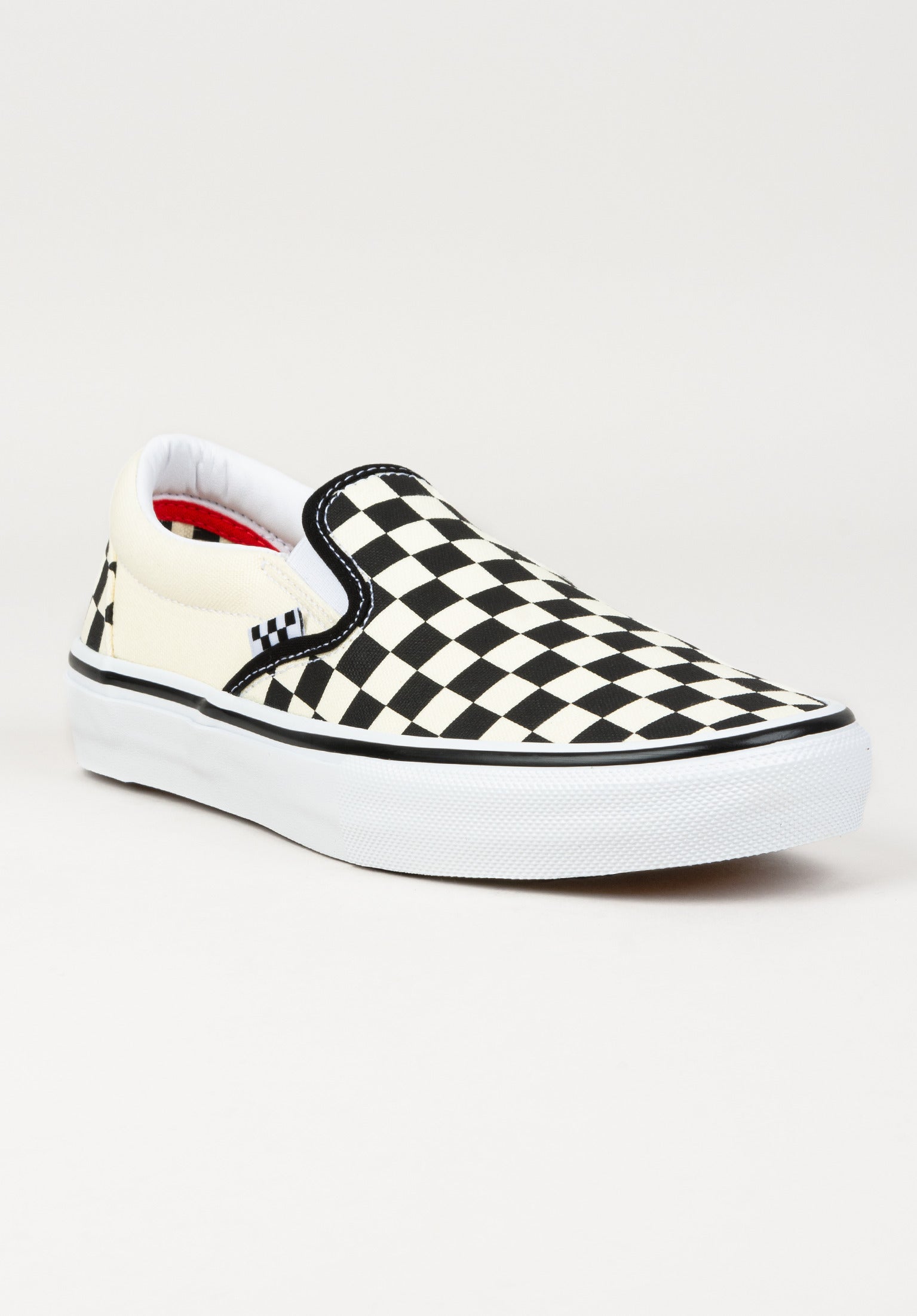 Black and white vans womens slip on best sale