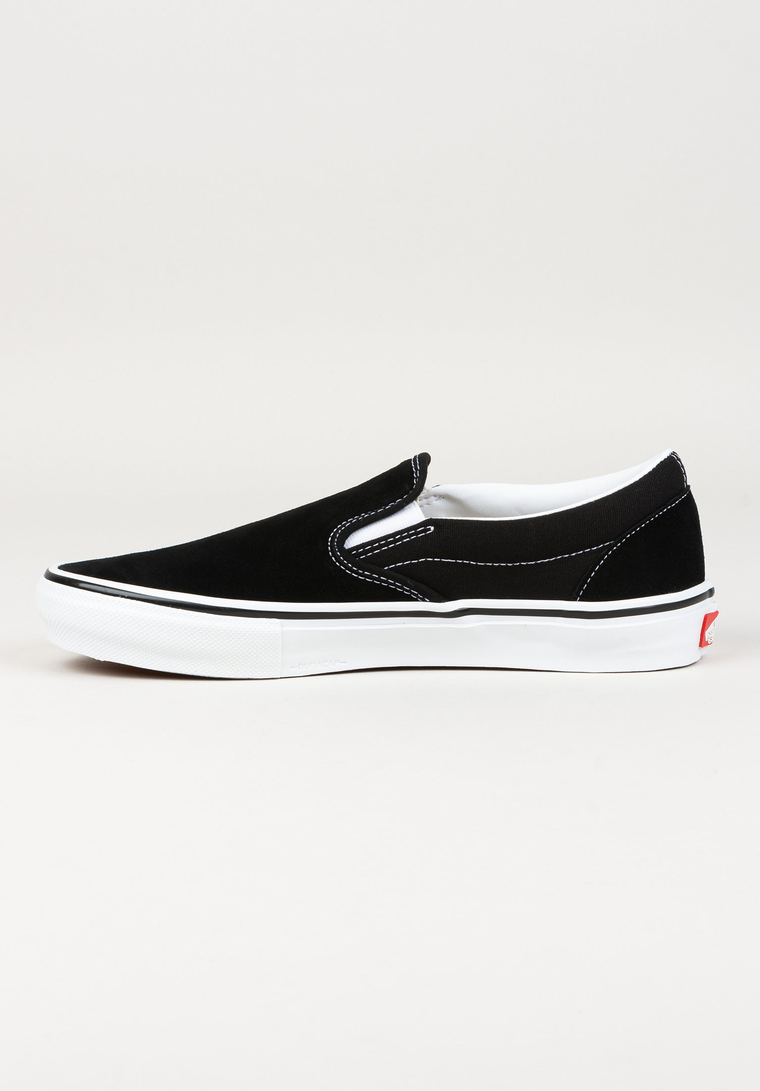 Mens all white slip on vans best sale