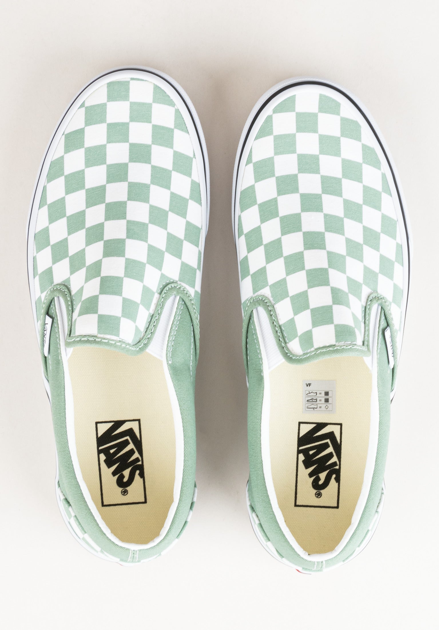 Checkerboard vans slip on womens best sale