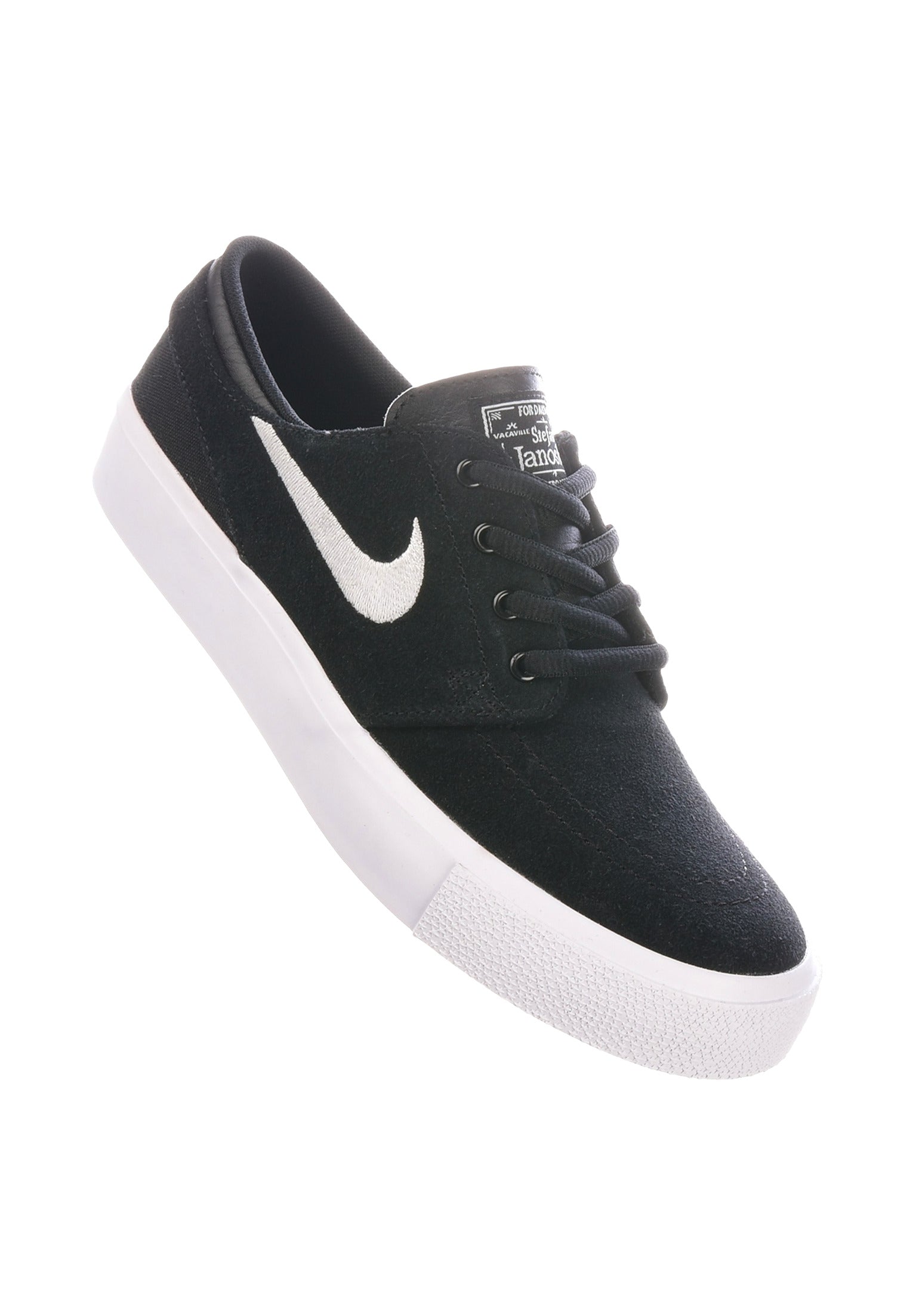 Nike sb janoski rm black and white best sale