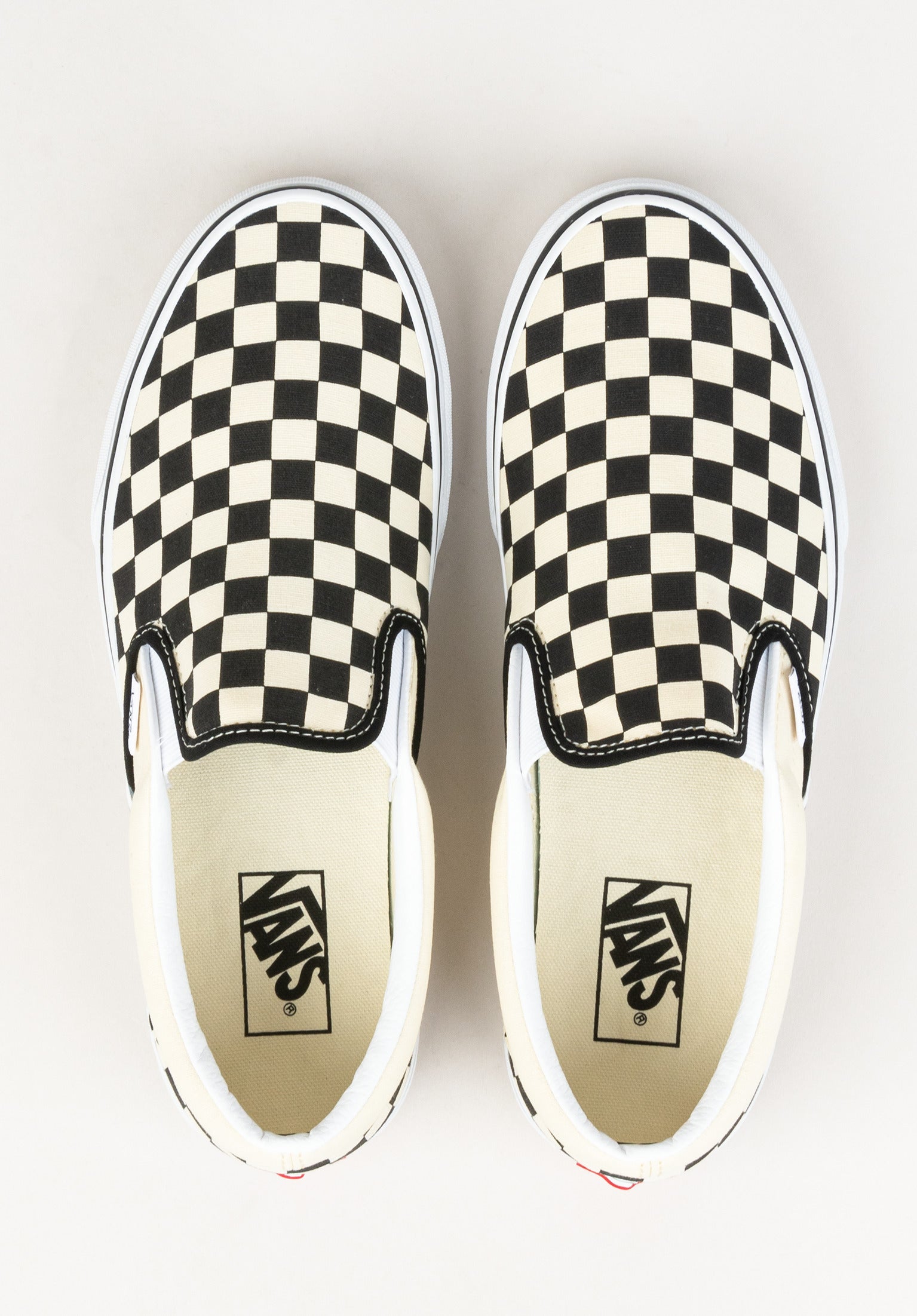 Checkerboard vans slip on hot sale cheap